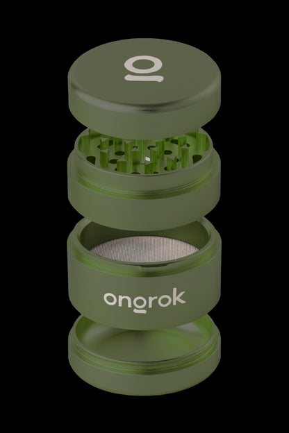 Green four-piece cannabis grinder with “onrok” logo.