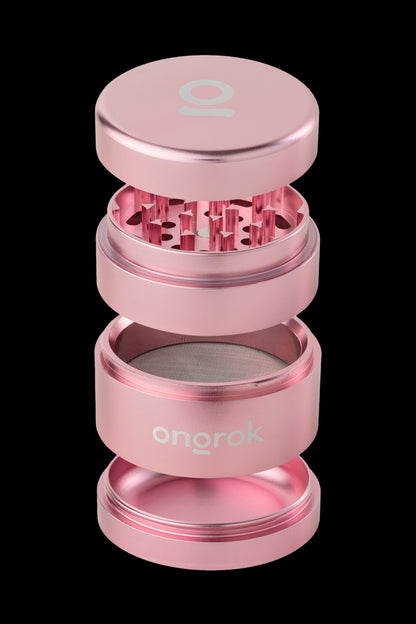 Pink four-piece cannabis grinder with the brand name "Onoro" etched on the middle section.
