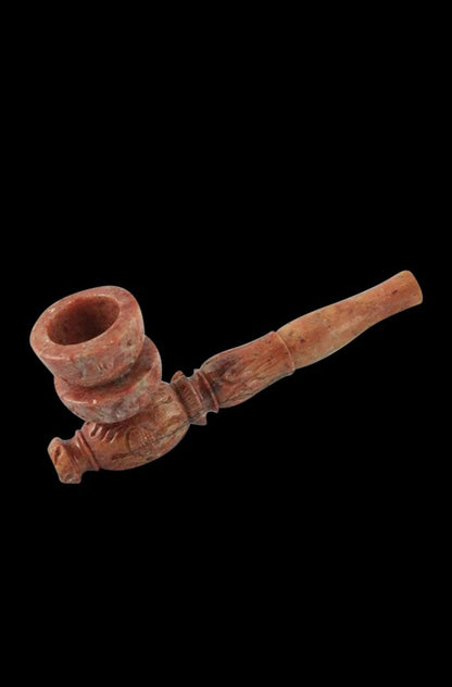 A close-up, angled view of the Marble Stone Pipe, showcasing its textured stone construction.