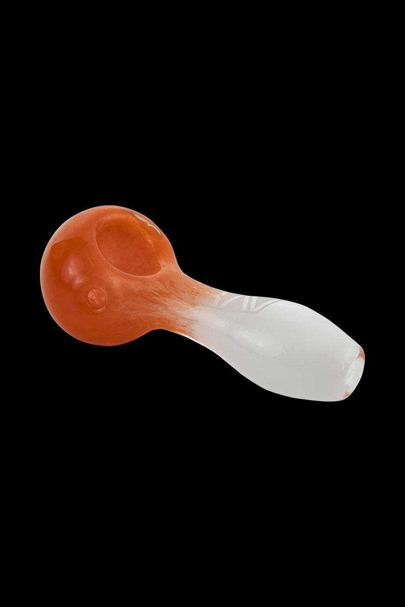 A side view of the GRAV® Frit Spoon, showing the curved glass bowl and smooth, polished finish.