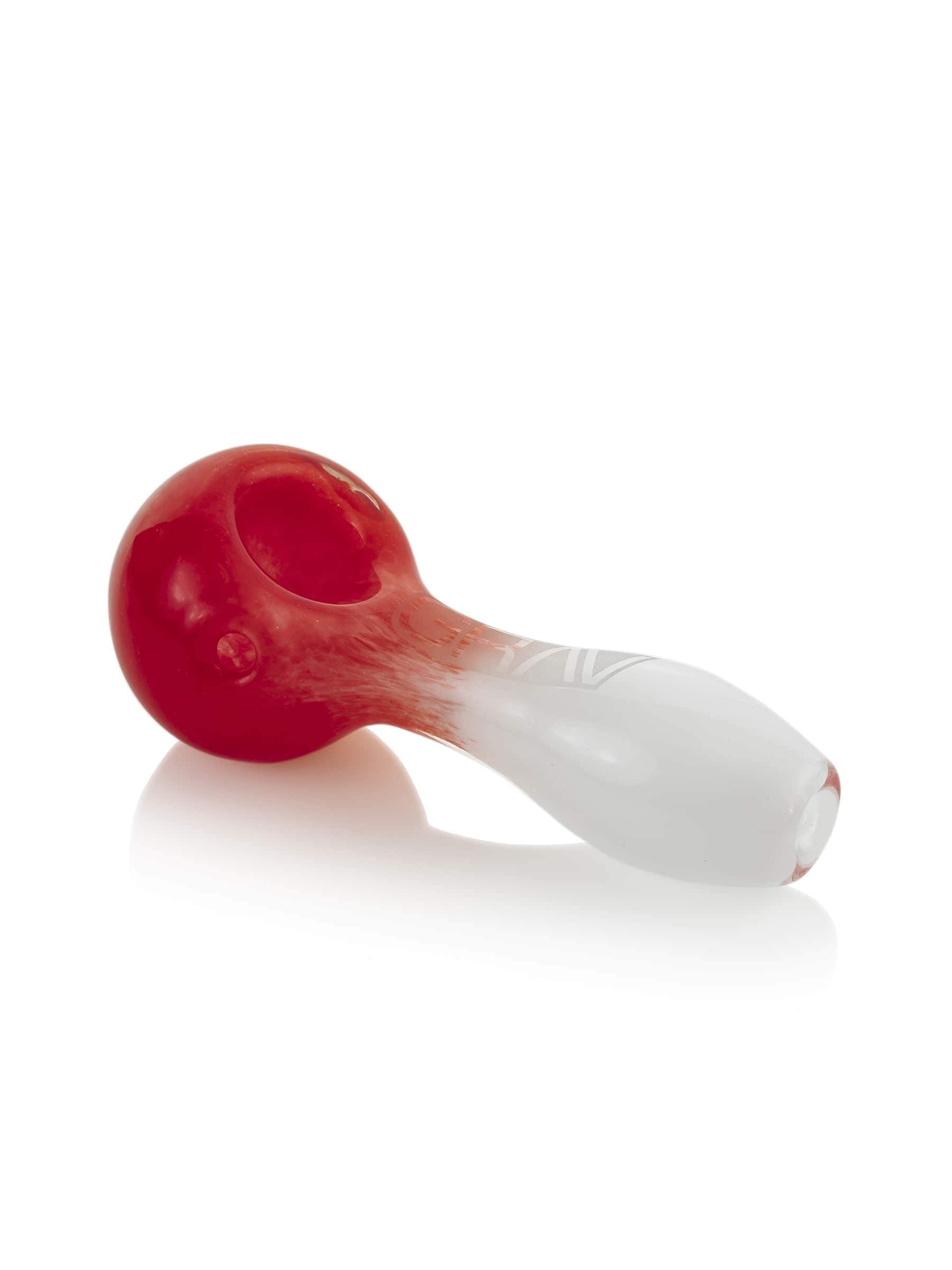 A side view of the GRAV® Frit Spoon, displaying its curved shape and glossy finish against a plain white background.