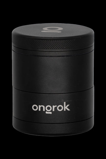 Black four-layer cannabis grinder with “onrok” logo.