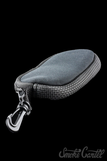 A close-up side view of the Dip Devices Soft Carry Case, showing its zippered closure and dark gray fabric texture.