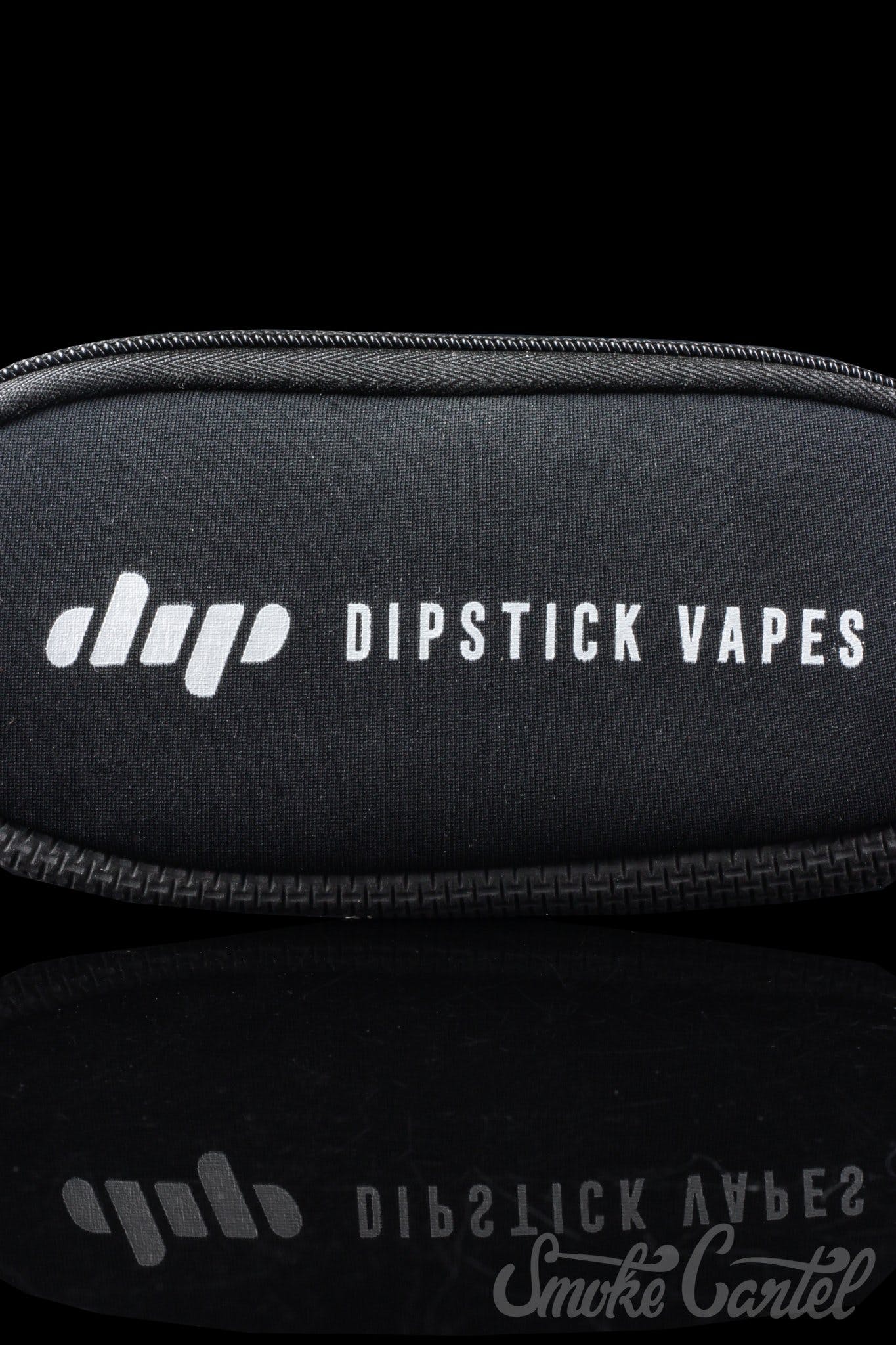 Close-up of the black Dip Devices Soft Carry Case with a subtle logo detail, angled on a dark surface.