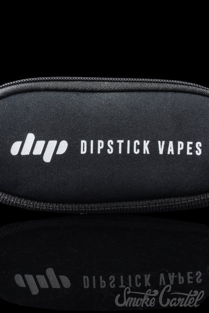 Close-up of the black Dip Devices Soft Carry Case with a subtle logo detail, angled on a dark surface.
