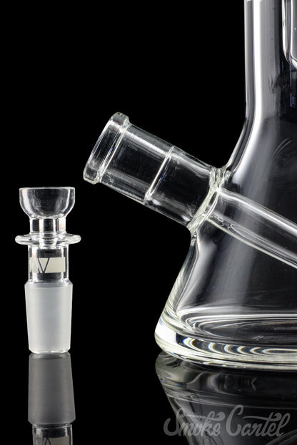 A studio shot of the GRAV® 8" Basic Beaker Bong, showcasing its clear glass construction and reflective surface.