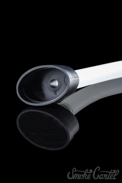 A low-angle shot showcases the sleek, black Dip Devices DipWhip Attachment reflecting on a dark surface.