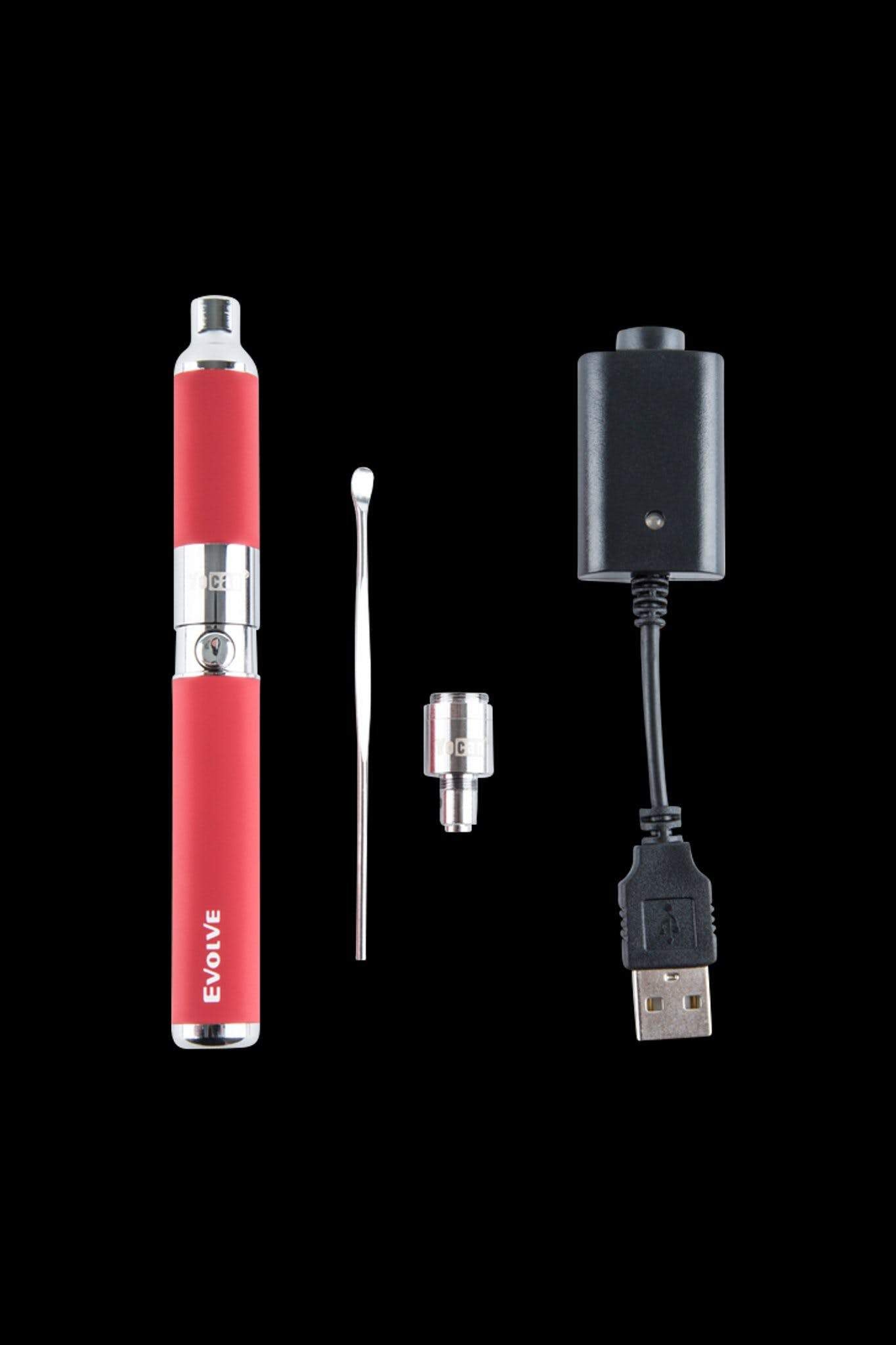 Red cannabis vape pen with charging accessories displayed on a black background.