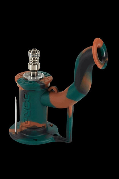 Green and orange silicone rig with glass downstem and bowl.