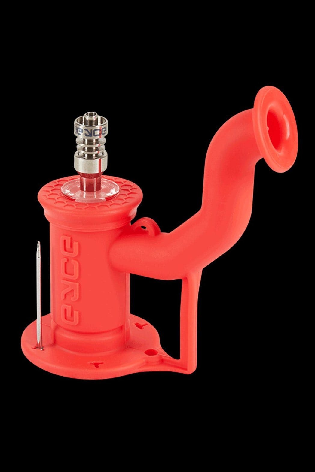 Red silicone oil rig with a quartz banger and dab tool.