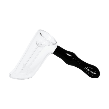 Angled close-up of the Famous X Straight Hammer Bubbler Pipe showing a clear glass bowl joined to a glossy black handle with the Famous X logo.