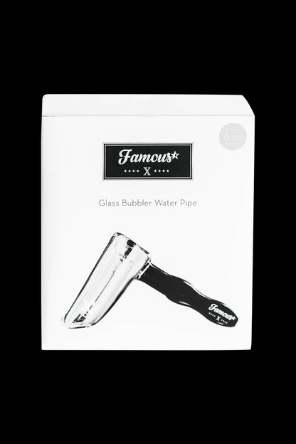Box-front view of the Famous X Straight Hammer Bubbler Pipe showing its angled clear glass bowl and black handle on white.