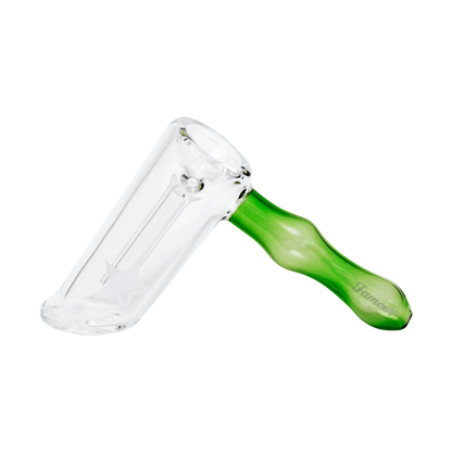 Close-up angled view of the Famous X Straight Hammer Bubbler Pipe showing the clear glass chamber meeting a green hammer-style handle.