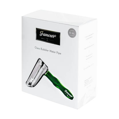 Angled close-up of the box artwork showing the Famous X Straight Hammer Bubbler Pipe with a green handle and white background.