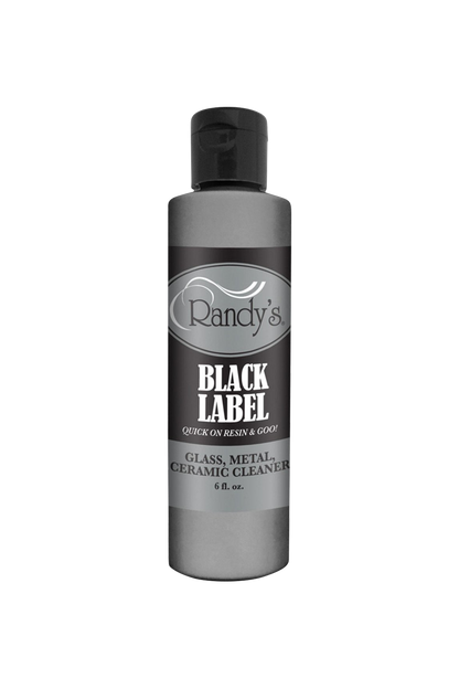 Front view of Randy's Black Label Cleaner, a cylindrical bottle with a black and white label, presented against a plain white background.