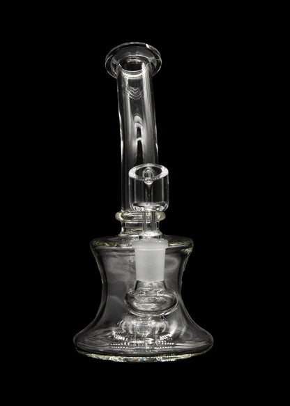 Clear glass bubbler water pipe against a black background.