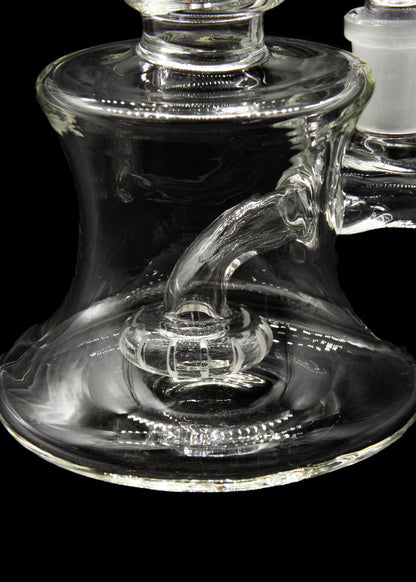 Clear glass water pipe (bong) with intricate percolator design.