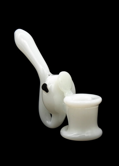 White glass rig with a bubbler and bowl, isolated on a black background.