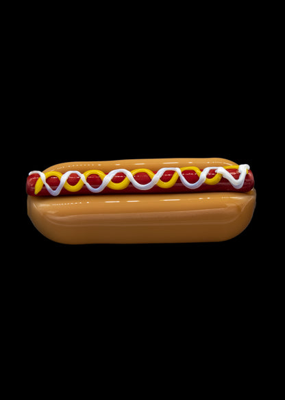 Hot dog-shaped cannabis case with colorful accents.