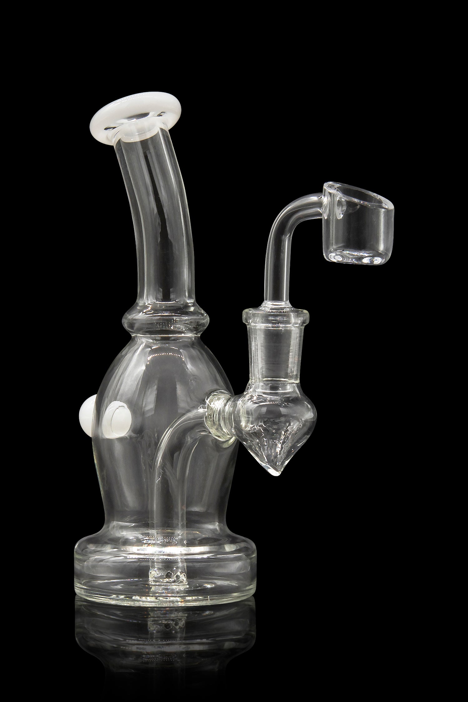 Clear glass dab rig with a quartz banger, isolated on a black background.