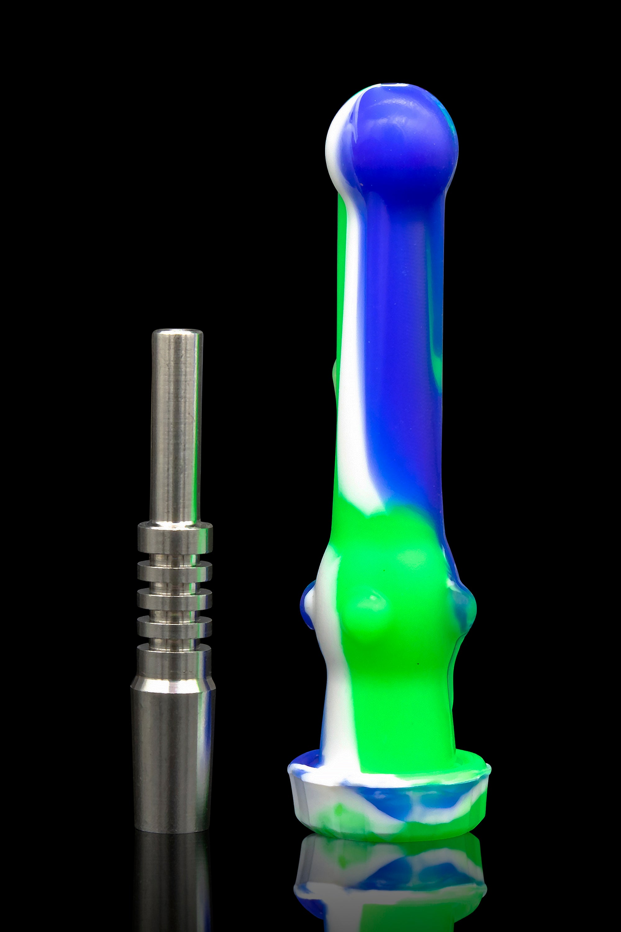 Colorful silicone dab tool and titanium tip against a black reflective surface.