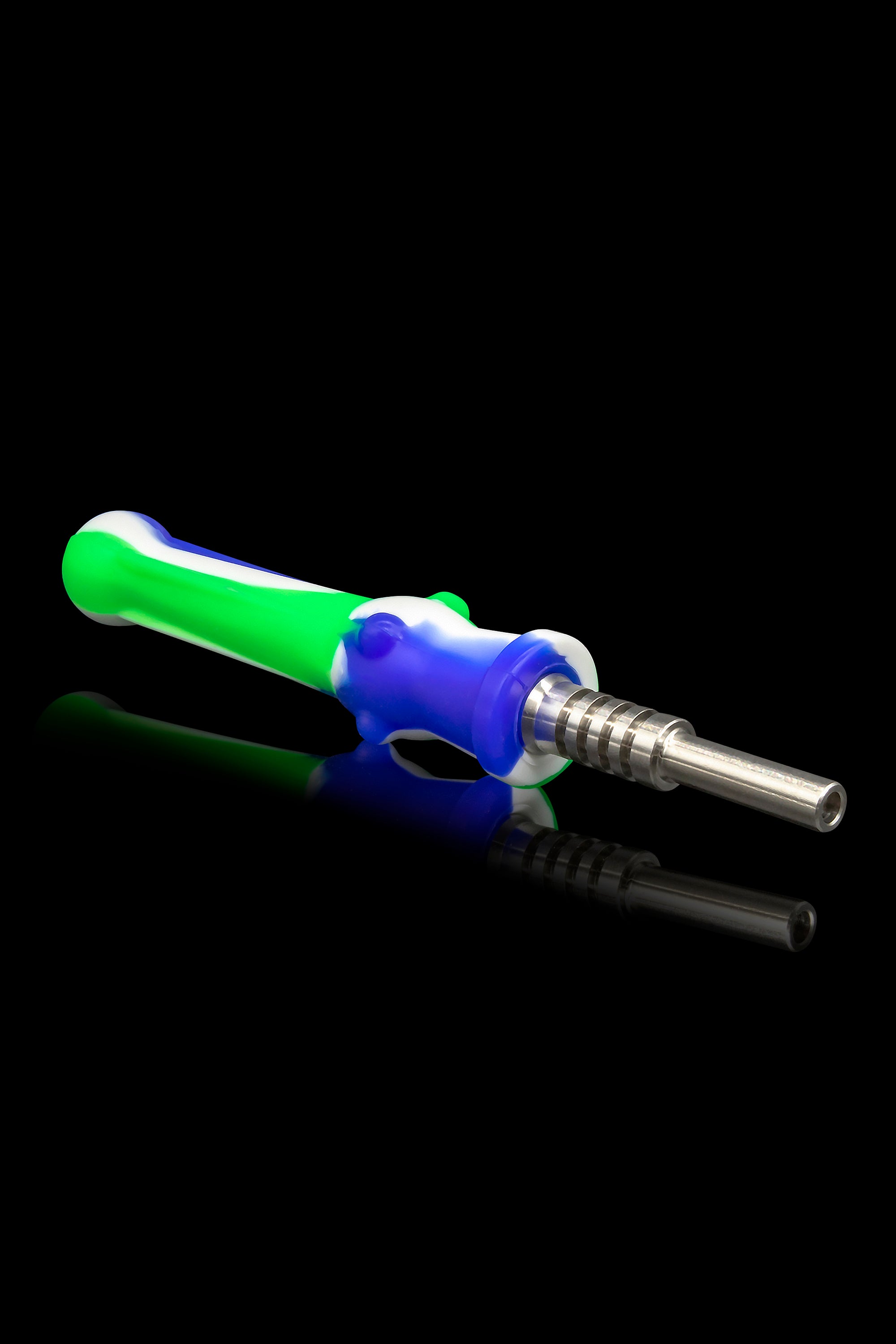Colorful silicone dab tool with a titanium tip, reflecting on a dark surface.