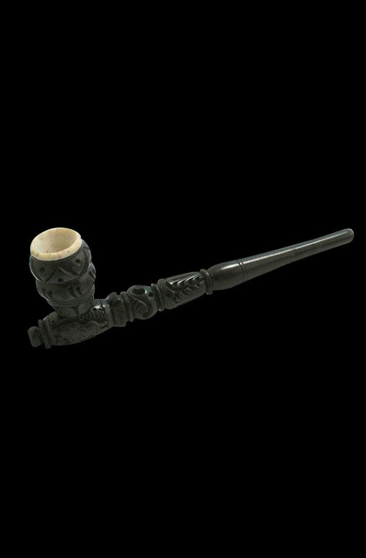The Wooden Pipe With Stone Bowl is shown in a side view, featuring a dark-colored wooden stem and a textured stone bowl.