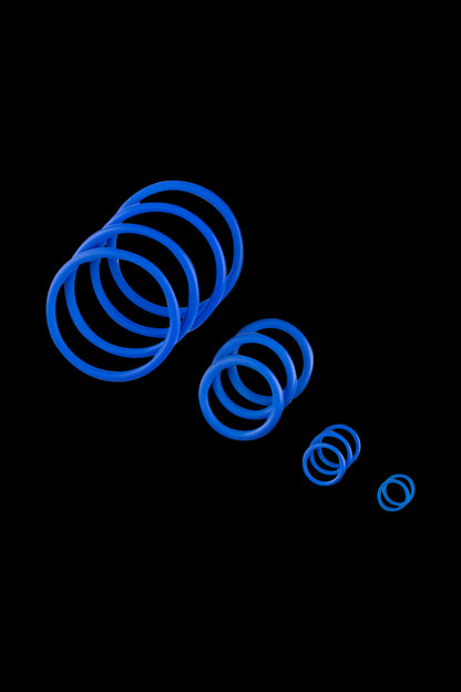 A top-down view of the Mighty Seal Ring Set, showing a collection of blue rubber rings arranged in a circular pattern.
