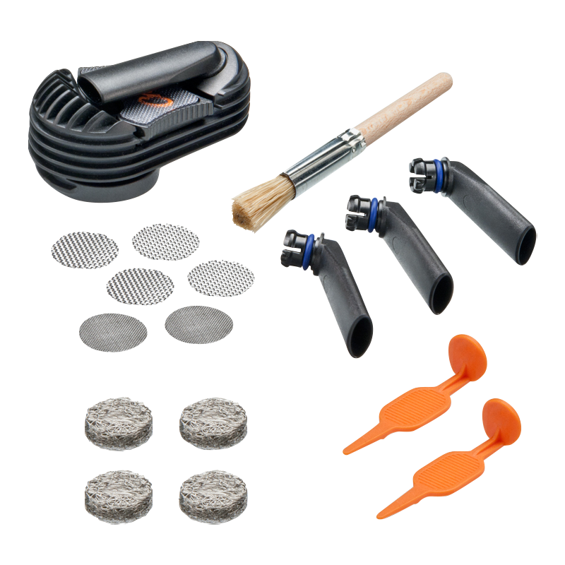 A flat lay of the Storz & Bickel Crafty Wear & Tear Set, featuring replacement parts and cleaning brushes against a white background.