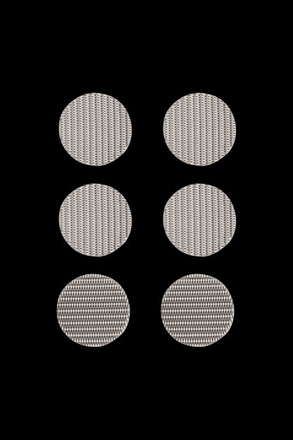 Close-up of the Storz & Bickel Mighty Vaporizer Screen Set, displaying a collection of small, metallic mesh screens against a plain white background.