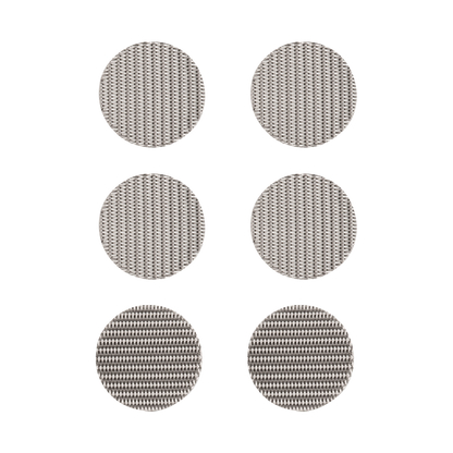 Close-up overhead shot of the Storz & Bickel Mighty Vaporizer Screen Set, displaying a collection of small, metallic mesh filters.