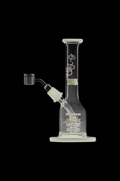 A side view of the Cheech & Chong "Jade East" Mini Rig Dabber, displaying its clear glass construction and compact size.