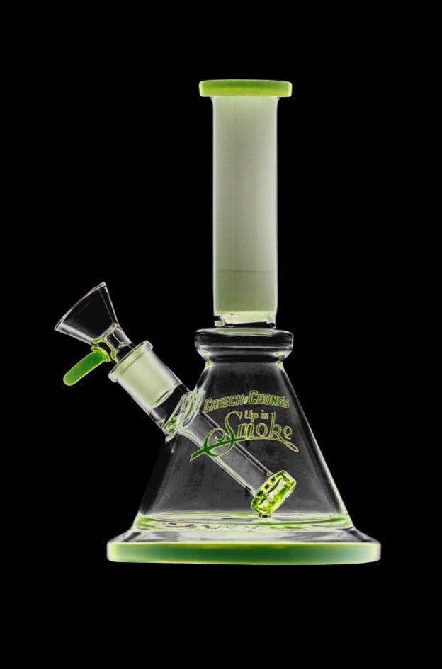 Front view of the Cheech & Chong "Pedro" Mini Beaker Bong, showcasing its compact size and clear glass construction against a dark background.