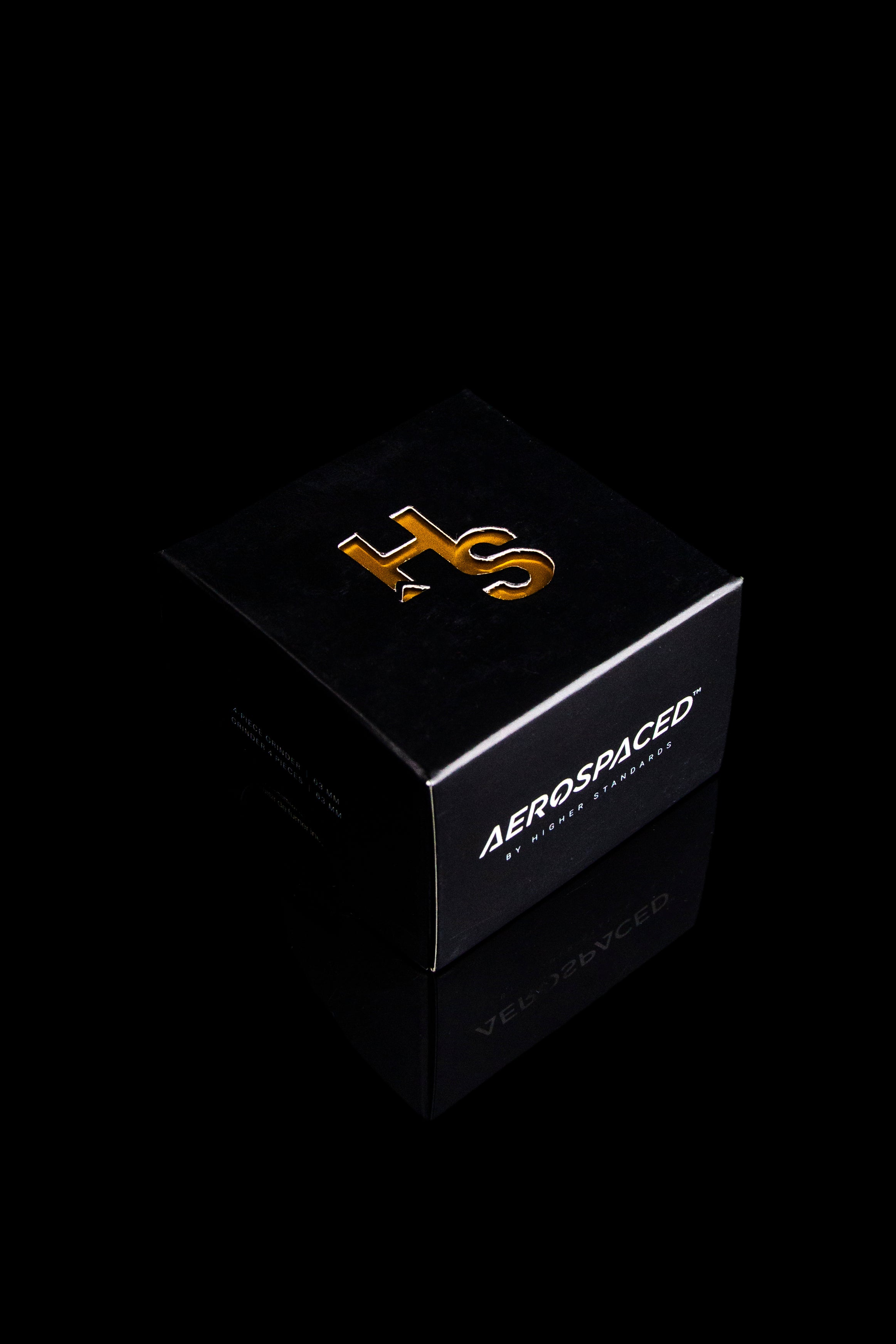 Sleek black box for “Aerospace” cannabis accessories with gold logo detail.