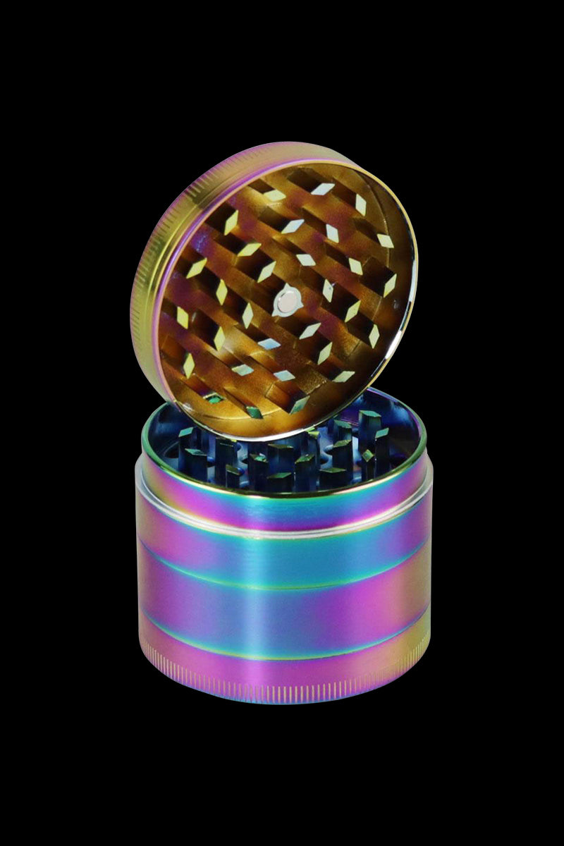 A top-down view of the open Medium 2.5" Anodized Zinc Chameleon 4-Piece Grinder, revealing its multi-tiered, metallic interior.