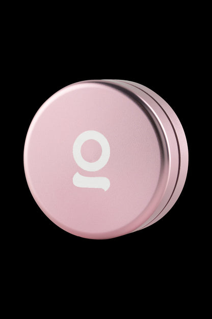 Pink metal tin with a white “10” logo, likely for cannabis storage.