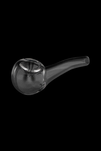 Clear glass pipe against a black background.