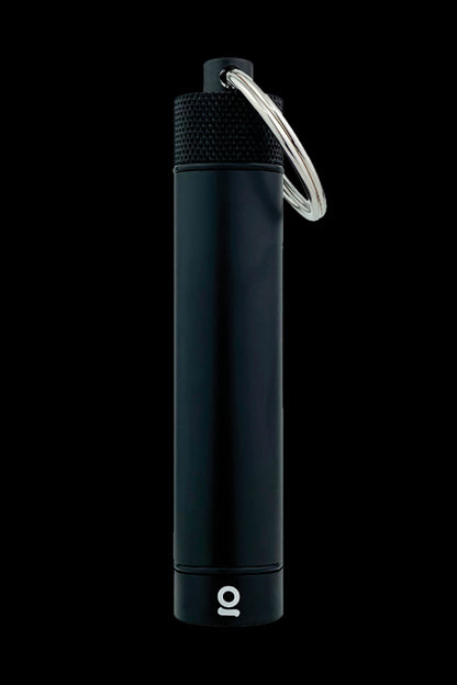Sleek black cannabis oil vape pen with a keychain attached, isolated on a black background.