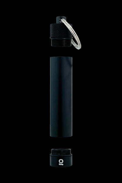 Black, cylindrical cannabis oil vape cartridge with a keychain attachment, shown disassembled.