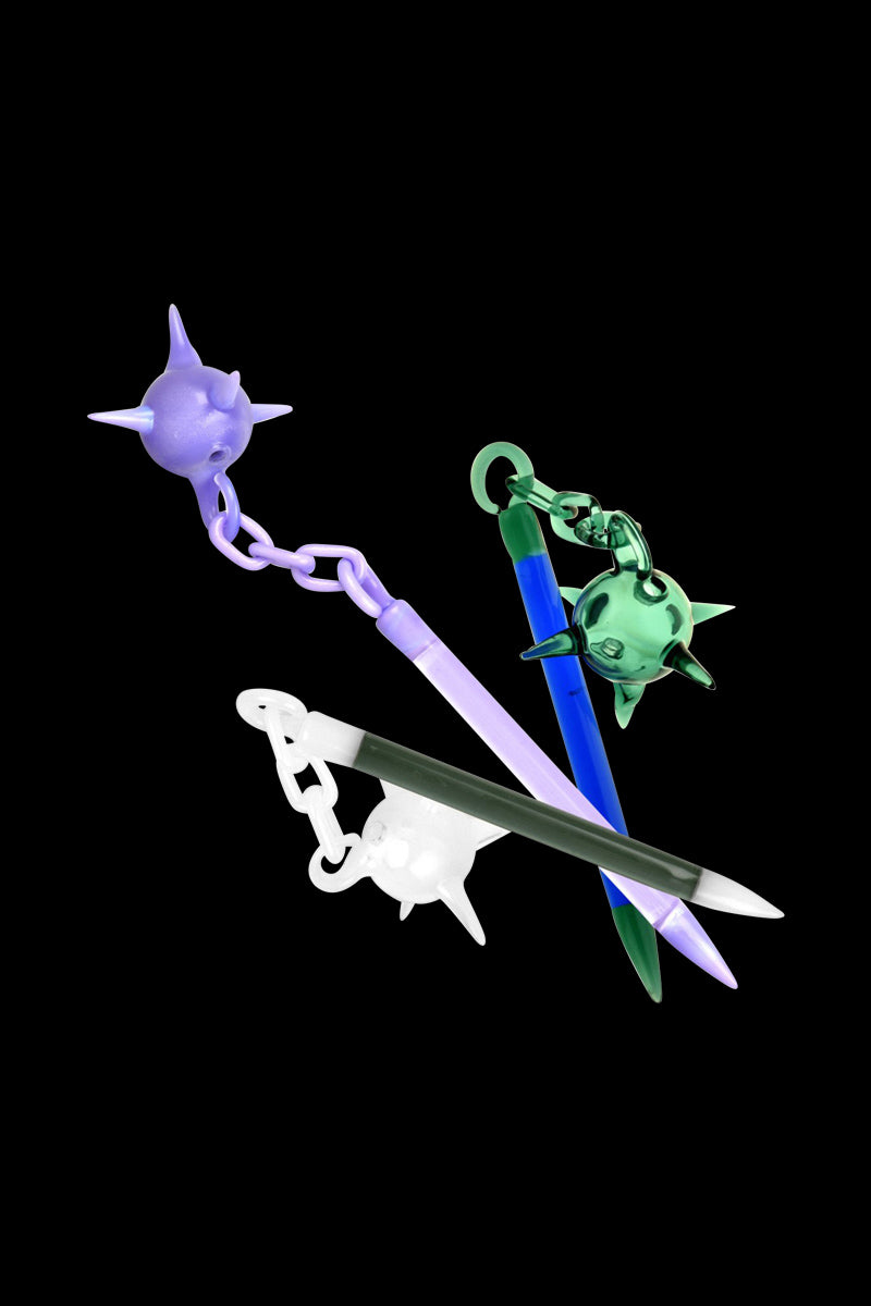 A diagonal view of “The Medieval Dabber” Fail Dabber Tool & Bubble Cap Combo with a polished metal finish against a dark background.