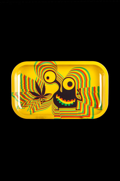 Colorful rolling tray with cannabis leaf and distorted face design on a yellow background.