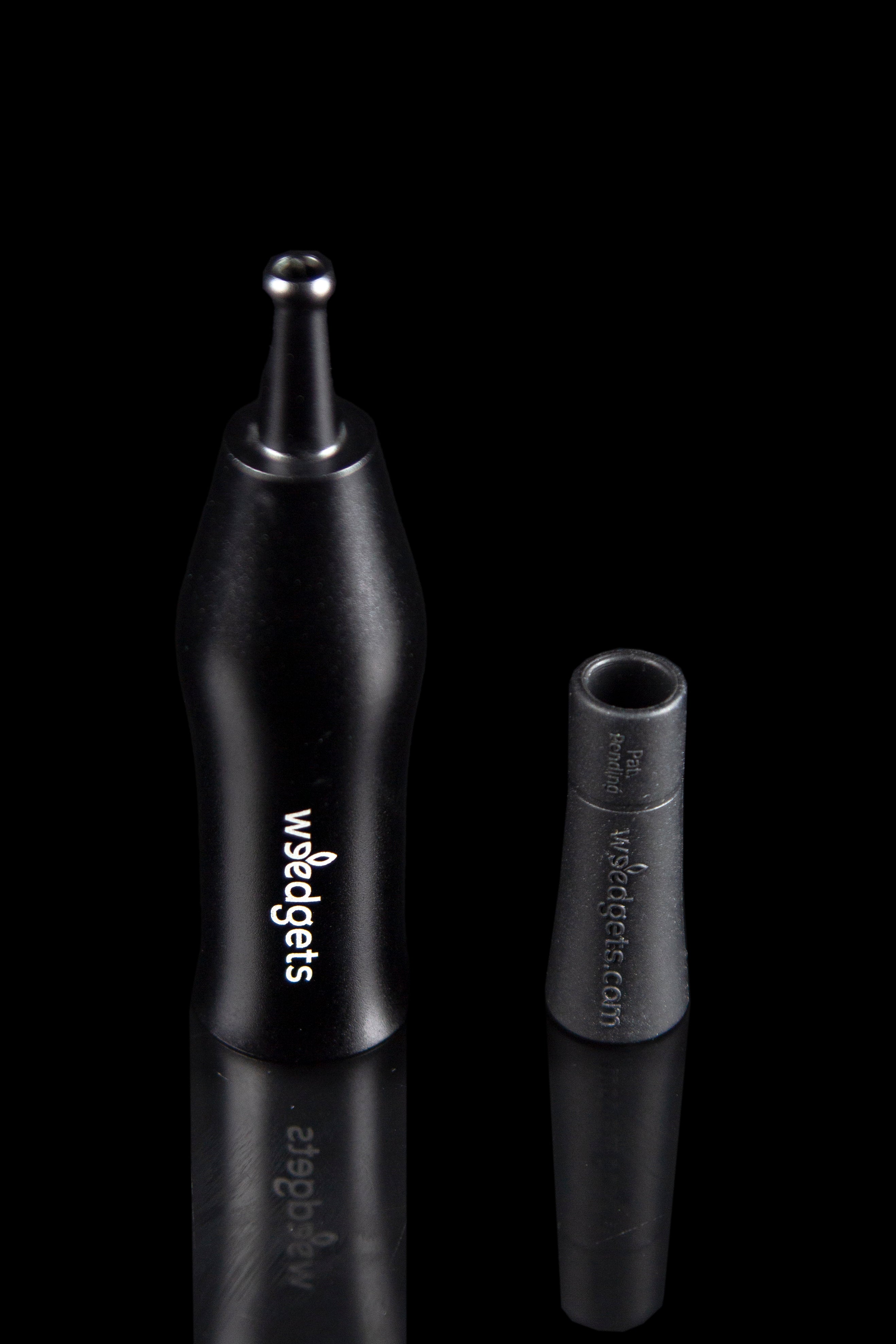 Black dab tool with a rounded tip and branded with “wisedgetz.com.”