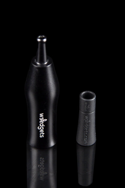 Black dab tool with a rounded tip and branded with “wisedgetz.com.”