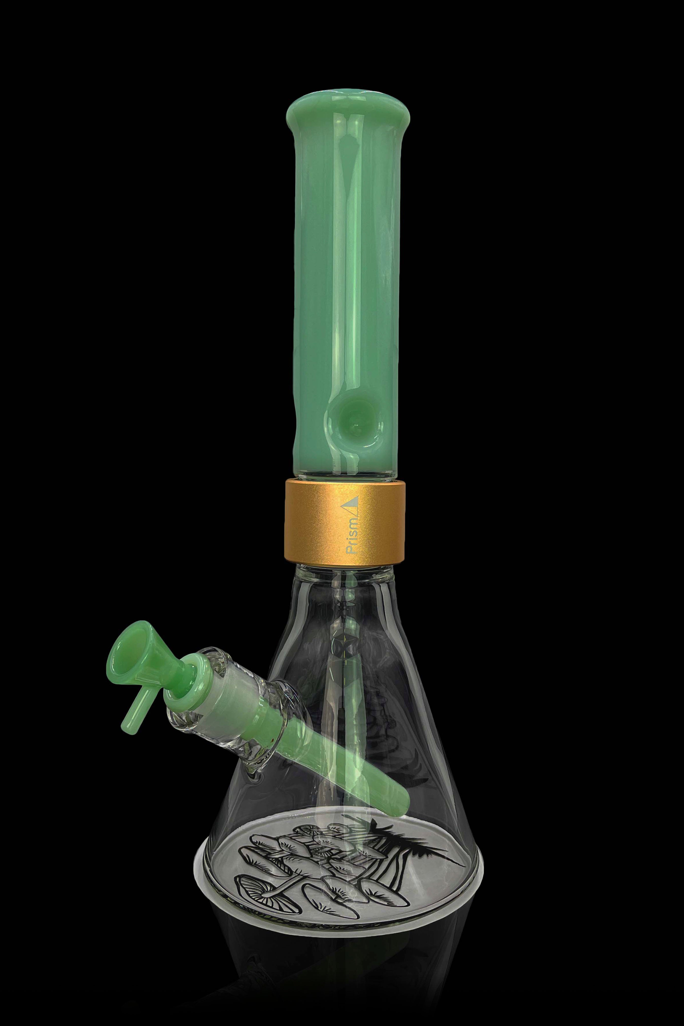 Green glass bubbler with palm tree base.
