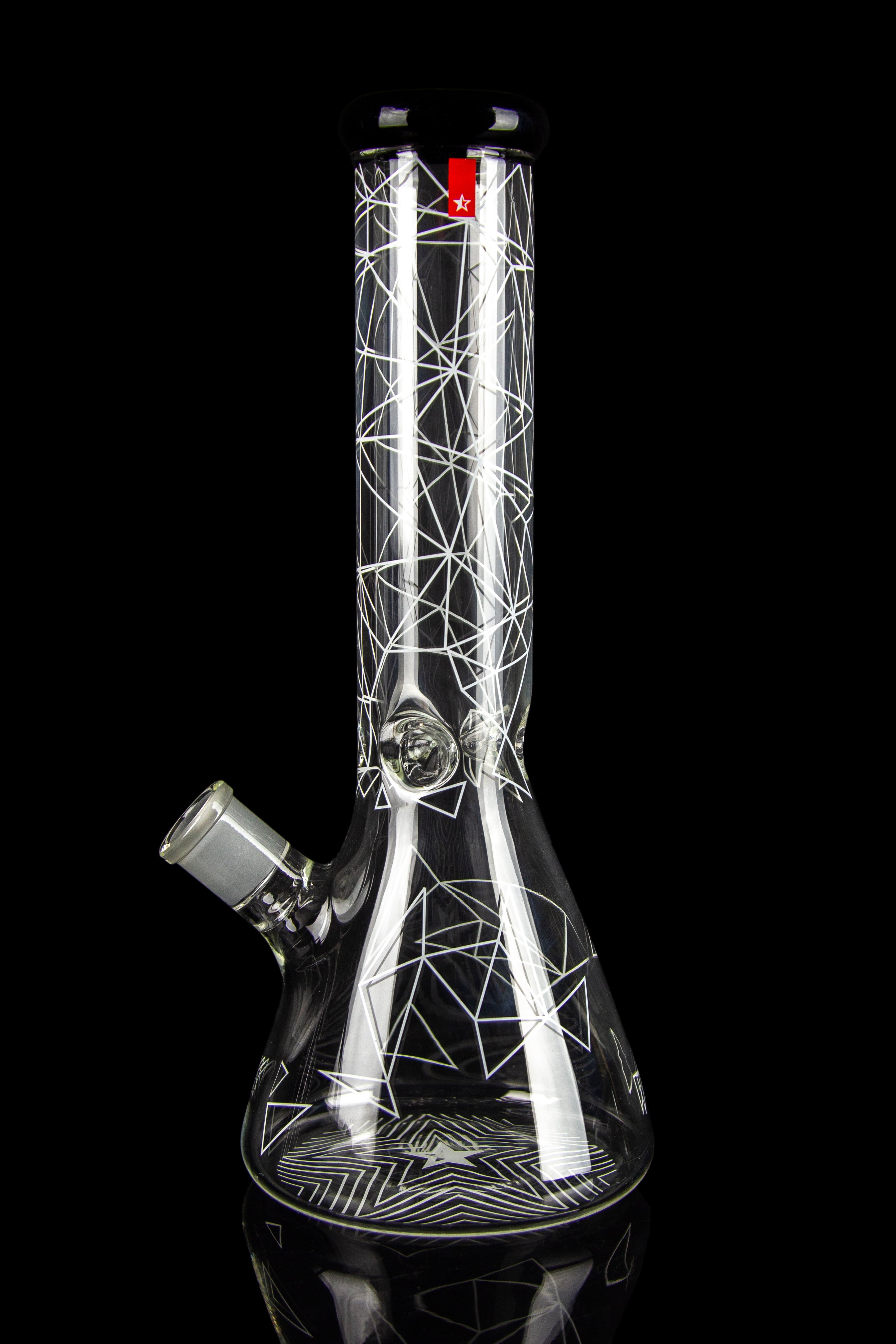 Close-up of the neck and body of the Famous Brandz Glass Beaker Ice Bong - Space showing white geometric line patterns on clear glass against a black background