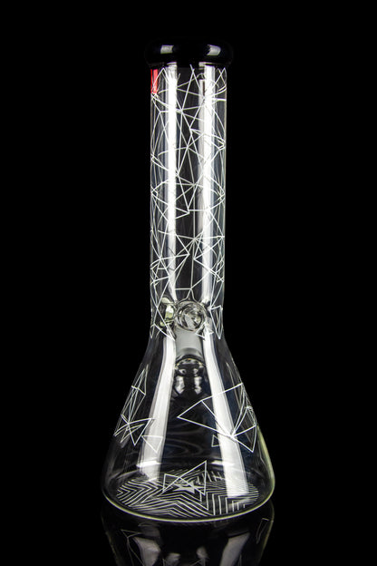 Close-up front view of the Famous Brandz Glass Beaker Ice Bong - Space showing white geometric line patterns on clear glass against a black background