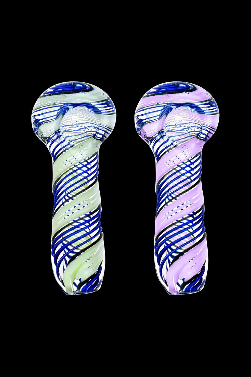 A close-up, angled view of the Spoon - Blue with Slime Twist, showing its curved shape and swirling blue and green glass pattern.