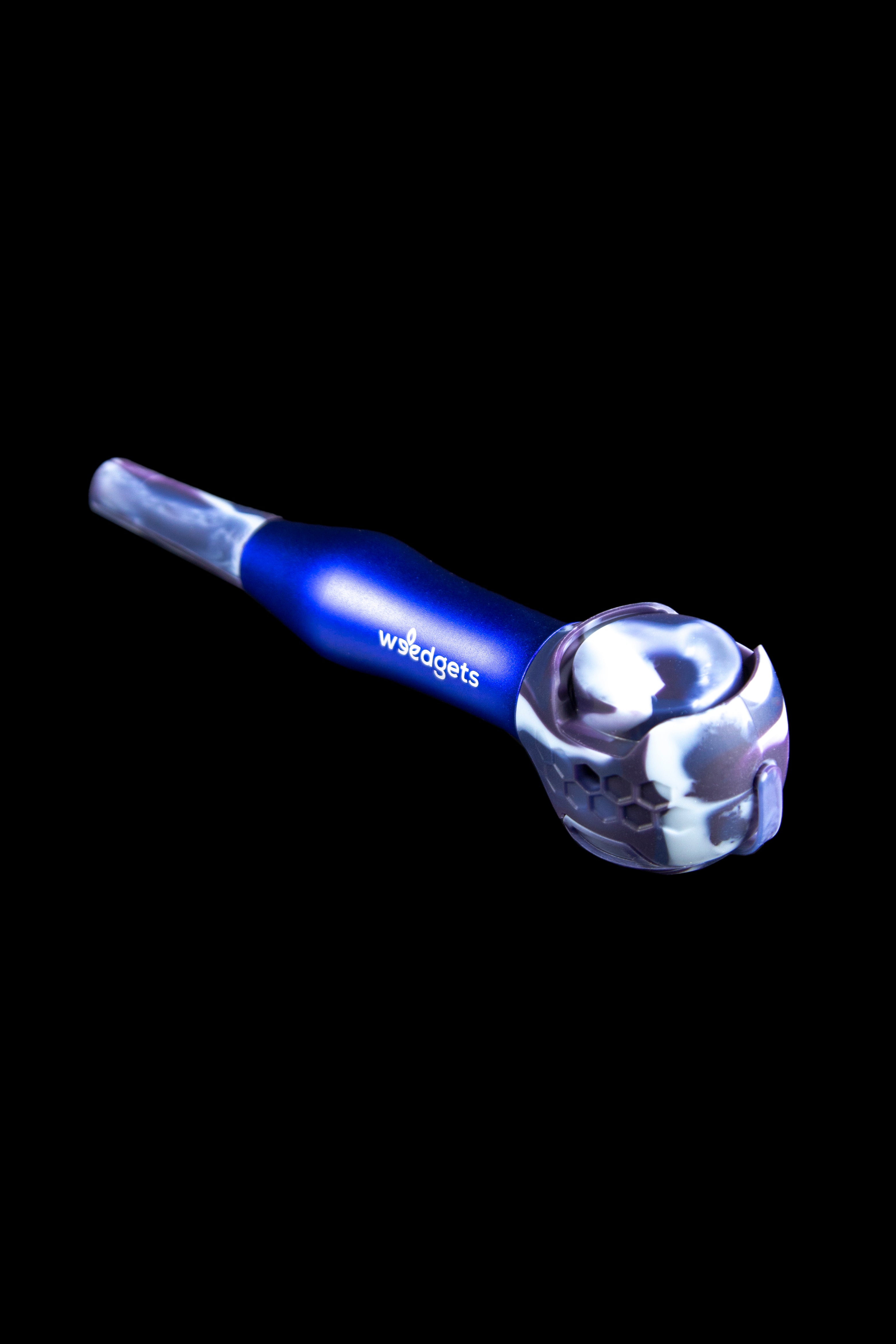Blue glass pipe with a floral-shaped bowl, against a black background.