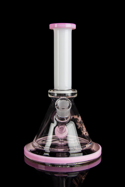 Pink and white glass water pipe (bong) on a black background.