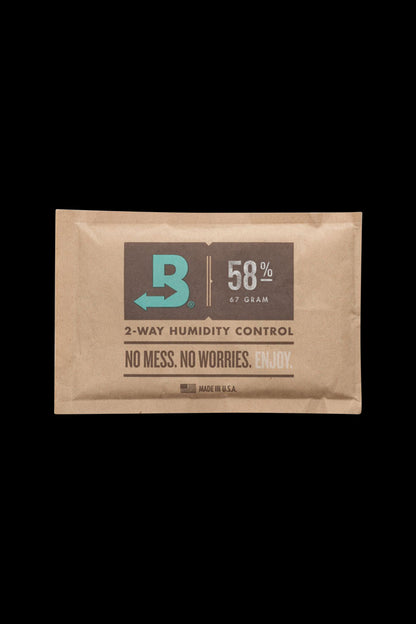 A close-up of the Boveda Humidity Control Pack for Dry Herbs - 58%, displaying the percentage prominently on a neutral background.